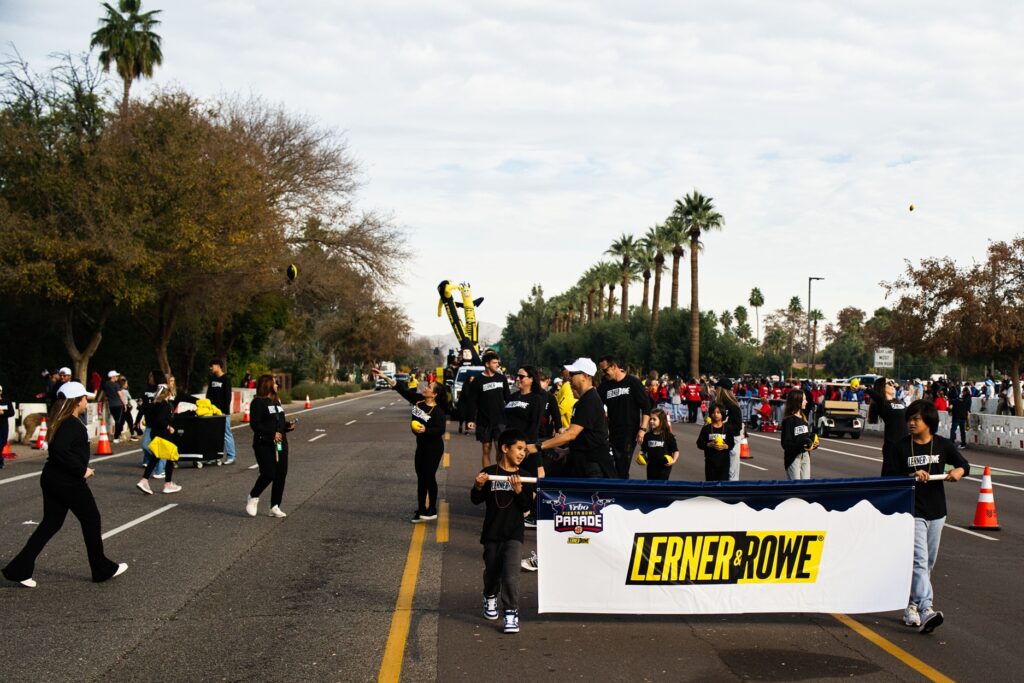 Lerner and Rowe banner at parade in Phoenix